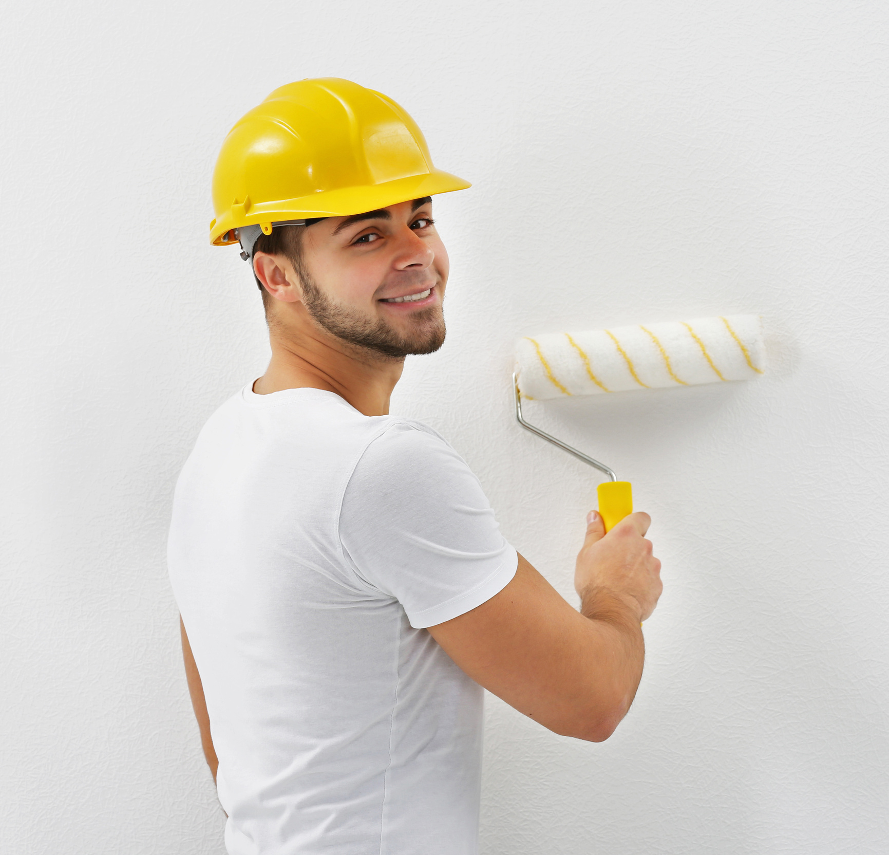 Worker Painting White Wall Background
